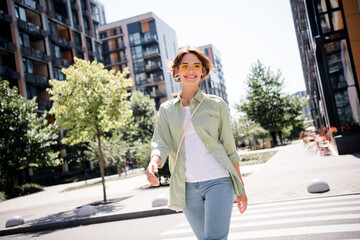 Photo of cheerful lovely girl dressed trendy outfit summer weekend free time after work urban style