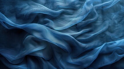 Fototapeta premium Canvas or muslin fabric cloth backdrop suitable for portraits products or concepts, with dramatic blue modulations.