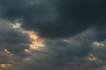 Cloudscape, Colored Clouds at Sunset near the Ocean in a Cloudy Day