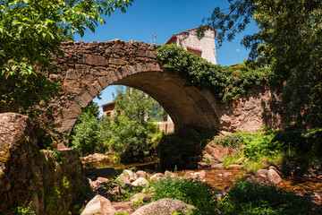 Stone Bridge Over Tranquil Waters