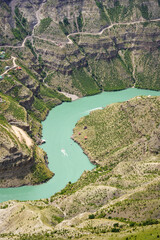 A mountain road along a river.