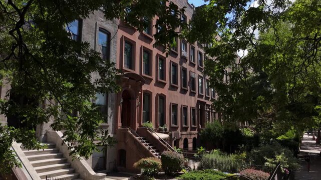 slower sunny flying towards brownstone houses in Carroll Gardens Brooklyn