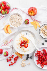 Greek yogurt with assorted berries, nuts and oat flakes