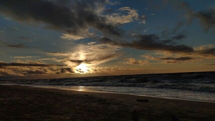 Obraz premium Beautiful sunset photo of Jurmala sea, sunset clouds, beach, Latvia