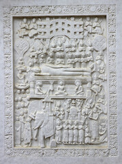 Marble carving in a Buddhist temple, nirvana or Buddha's sleep.