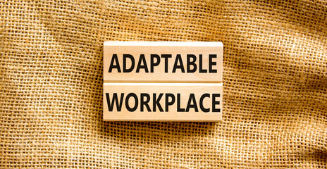 Adaptable workplace symbol. Concept words Adaptable workplace on beautiful wooden block. Beautiful...