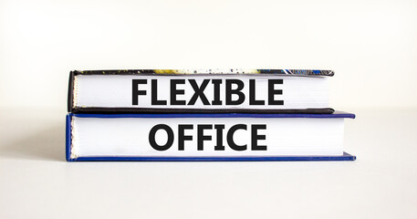 Flexible office symbol. Concept words Flexible office on beautiful books. Beautiful white paper background. Business Flexible office concept. Copy space.