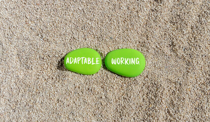 Adaptable working symbol. Concept words Adaptable working on beautiful green stone. Beautiful sea sand beach background. Business Adaptable working concept. Copy space.