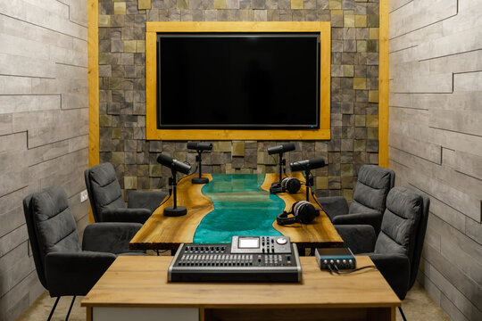 Build a podcast studio with quality microphones, mixer, and soundproofing for top recording results