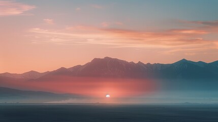 Serene Sunrise Over Misty Mountains and Golden Field