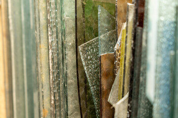 colored broken glass for stained glass art. colored glass sorted and arranged for the art of glass painting
