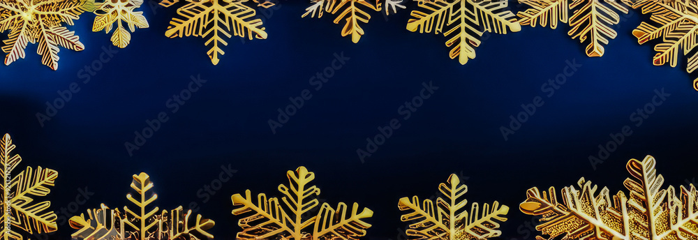 Wall mural the banner is a dark blue christmas background with snowflakes on the edge with an empty space for t