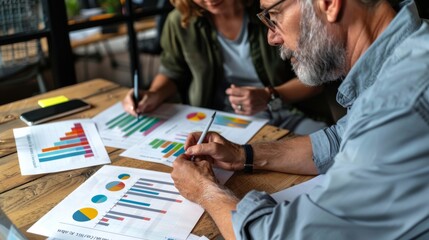 Middle-aged couple exploring retirement savings plans with a financial planner, using digital tools and charts, modern office space, advisor providing expert guidance