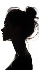 A graceful outline of a woman highlights her elegant features and hairstyle