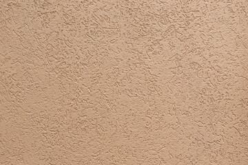 Textured painted orange wall. Abstract textured background.