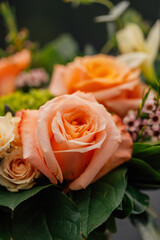 bouquet of orange, pink  roses