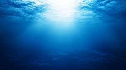 Sunlight filtering through calm ocean water at midday
