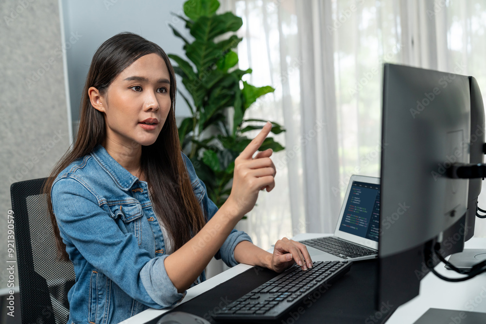 Poster young asian girl of it developer pointing online information on pc with coding program data applicat