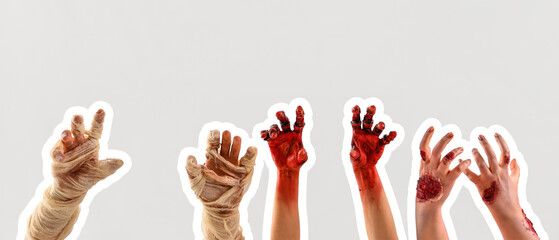 Zombie and mummy hands on white background. Halloween celebration