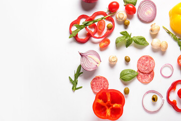 Ingredients for preparing pizza on white background