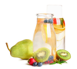 Bottles of infused water with different sliced fruits on white background
