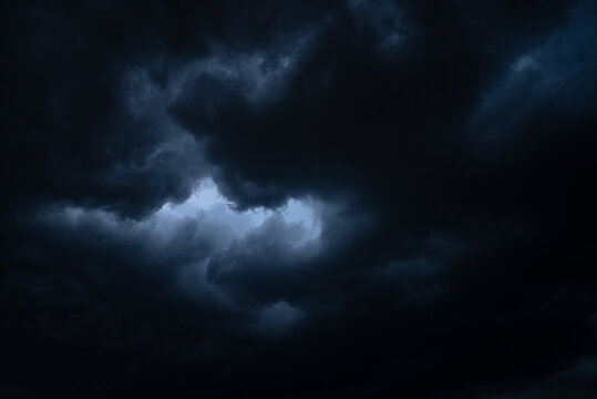 dark thundercloud (cumulonimbus) seen from below