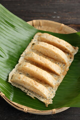 Kue Bandros or Pancong, Traditional Indonesian Cake Made from RIce Flour, Grated COconut, and Coconut Milk