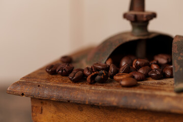 Coffee beans inside an old grinder.