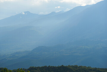 Fototapeta premium Colombian Andean landscape, Layers of mountains that extend, covered with vegetation, to the horizon.