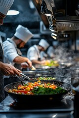 Chefs preparing colorful vegetables in a busy kitchen.
