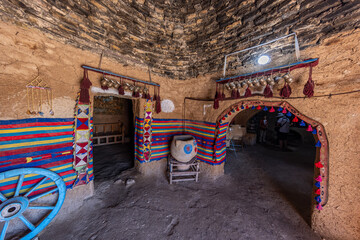 Traditional conical houses of Harran, Sanliurfa, Turkey. Traditional mud brick buildings topped...