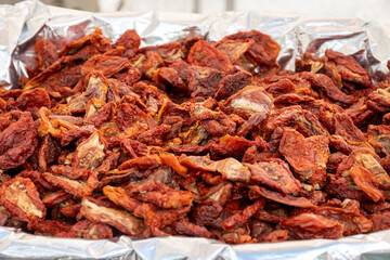 Red Italian sun dried tomatoes on Italian street market