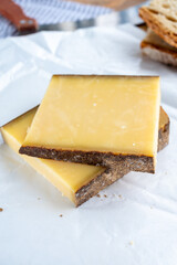French aged in caves cheese Comte, made from unpasteurised cow milk Prestige,  Vieille Reserve close up