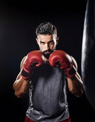 A man wearing boxing gloves