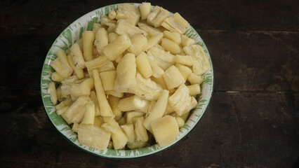 Singkong rebus or boiled cassava is a traditional Indonesian meal made from steamed cassava. Focus selected