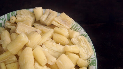 Singkong rebus or boiled cassava is a traditional Indonesian meal made from steamed cassava. Focus selected