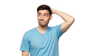 Young doubtful man thinking, scratching head and trying to find solution