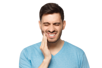 Young man in blue t-shirt touching his face and closing eyes with expression of horrible suffer from aching tooth