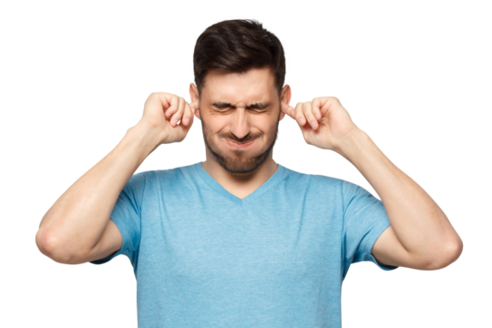 Young man in blue t-shirt closing ears suffering from loud noise