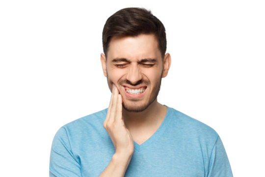 Young man in blue t-shirt touching his face and closing eyes with expression of horrible suffer from aching tooth