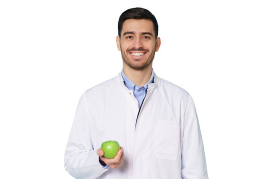 Smiling nutritionist or dentist doctor wearing white coat and round glasses, holding green apple in hand - Powered by Adobe