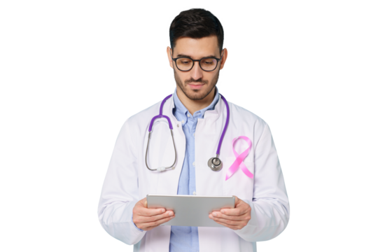 Young oncologist doctor with pink ribbon on his white coat looking at tablet, using app for medical check up. Breast cancer awareness month concept