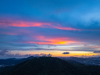 aerial night view beautiful lighting around the Phuket big Buddha.  .Twinkling lights along the beach and in various towns around Phuket Island. .creative nature and travel concept.lighting