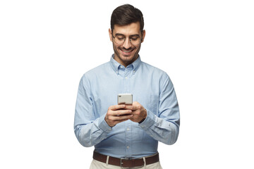 Portrait of cheerful businessman in round glasses typing message with phone