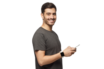 Portrait of handsome young man dressed in gray t-shirt, holding phone, looking at camera