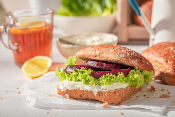 Tasty and homemade sandwich with cheese and beetroot.
