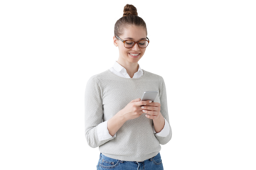 Smiling student girl typing message on the phone, holding her smartphone with both hands