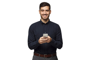 Young businessman, holding phone, looking at camera and smiling nicely