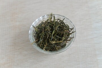 Dried taxus in a bowl