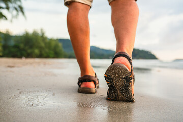 Walking on the beach, close up 